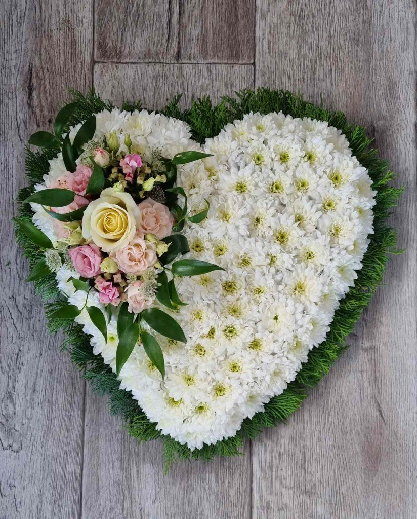 massed heart shaped funeral , Sacred Bloom
